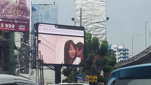 Man arrested for playing porn on giant video billboard