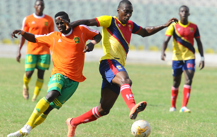 Hearts of Oak’s Kenneth Okoro gains the upperhand during a tussle with Nicholas Gyan of Dwarfs Hearts of Oak’s Kenneth Okoro gains the upperhand during a tussle with Nicholas Gyan of Dwarfs