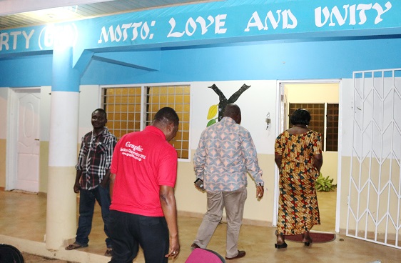 Madam Akua Donkor leading the Graphic team into the national headquarters of the party at Kabu, near Adawso