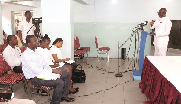 Mr Ibrahim Akabila (right), Coordinator, Ghana Trade and Livelihood Coalition (GTLC), addressing participants at the launch 