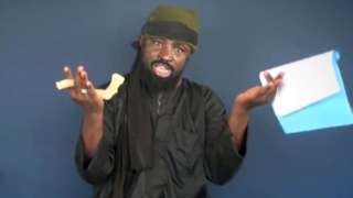 Shekau, seen here in a video last year, said he was in a "happy state" Shekau, seen here in a video last year, said he was in a "happy state"