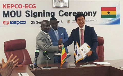 The Managing Director of the ECG, Mr Robert Dwamena, and the Vice-President and Chief Global Business Officer of KEPCO, Mr Bong–soo Ha, in a handshake after the signing of the agreement. The Managing Director of the ECG, Mr Robert Dwamena, and the Vice-President and Chief Global Business Officer of KEPCO, Mr Bong–soo Ha, in a handshake after the signing of the agreement.