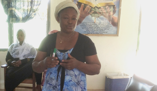 Madam Elham Mumuni explaining some issues at the training programme 25 Women from two regions upgrade skills
