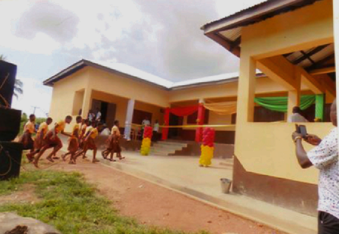 The front view of the new school block. Assembly constructs classroom block for JHS