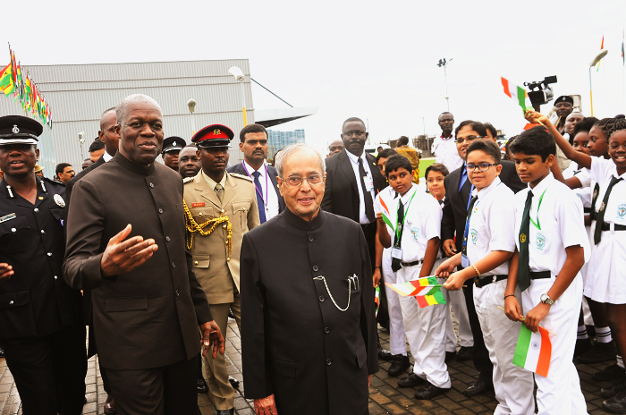 President Pranab Mukherjee of India being welcomed by some students of the DPS International School. With him is Vice-President Kwesi Amissah-Arthur. Picture: EBOW HANSON Indian Prez arrives for two-day visit
