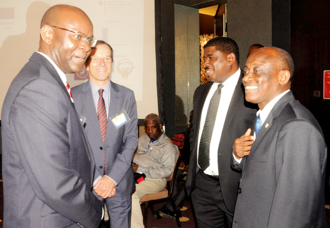 Mr Seth Terkper (right) interacting with Mr Andrew Okello (left), Senior Economist at the International Monetary Fund (IMF), Mr Wiebe Anima (2nd left), of the Netherlands Ministry of Foreign Affairs and Mr George Blankson (2nd right), Chief Executive Officer of the Ghana Revenue Authority (GRA), at the seminar in Accra. Picture: GABRIEL AHIABOR Govt seeks IMF assistance on tax reforms