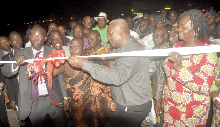 Barima Akwasi Offei Okogyeasu (2nd left), the Chief of Kokofu, being assisted to cut the tape to inaugurate the Centre for Renewable Energy and Energy Efficiency block for the Kumasi Polytechnic at Piase. Those with him include President Mahama (2nd right), Prof. Naana Opoku-Agyemang (right), and Mr Nicolas Nsowa-Nuamah (left), the Rector of the Kumasi Polytechnic. INSET: The Centre for Renewable Energy and Energy Efficiency, Kumasi Polytechnic block at Piase. Picture: EMMANUEL BAAH All polytechnics will be converted to varsities - President Mahama assures
