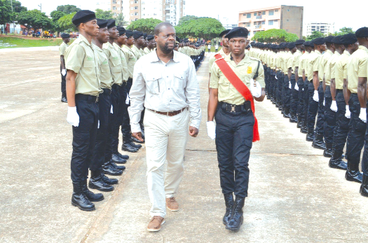 Mr Beecham reviewing the parade 500 beneficiaries of Prisons Module pass out