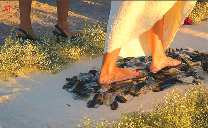 The broken glass represent fears, hardship and challenges that they will have to overcome The broken glass represent fears, hardship and challenges that they will have to overcome