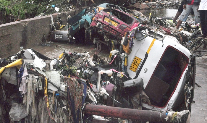 Mangled vehicles in the Nima drain Mangled vehicles in the Nima drain