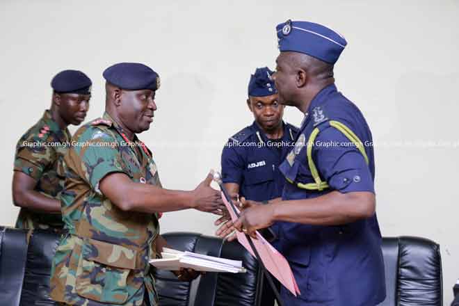 Lieutenant General Obed Akwa (left), the Chief of the Defence Staff, exchanging pleasantries with Mr David Asante-Apeatu after the press conference. Picture: EMMANUEL ASAMOAH ADDAI Lieutenant General Obed Akwa (left), the Chief of the Defence Staff, exchanging pleasantries with Mr David Asante-Apeatu after the press conference. Picture: EMMANUEL ASAMOAH ADDAI