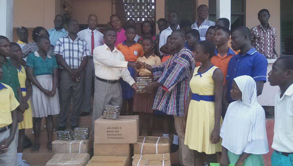Nana Nkwantabisa (right), presenting the items to a representative of the GES Nana Nkwantabisa (right), presenting the items to a representative of the GES