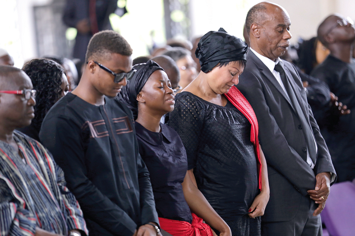 From left: Captain Mahama (Rtd), Michael Mahama, Mrs Barbara Mahama, wife of the late Major Mahama, and Mrs Veronica Bamford-Addy in worship mood at the thanksgiving service of the late Major Mahama at the Light House Chapel International, Qodesh in Accra.