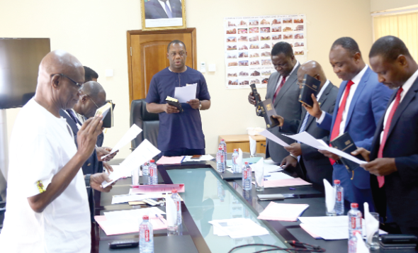 Members of the board swearing the Oath of Office Members of the board swearing the Oath of Office