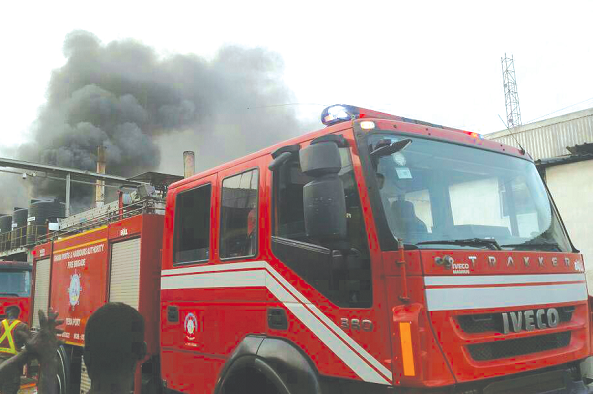 Officials of the fire service struggling to put out the blaze Officials of the fire service struggling to put out the blaze