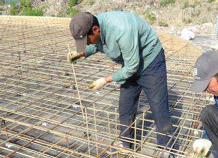 The fibre glass re-enforced polymer bar being fixed at a construction site in Accra The fibre glass re-enforced polymer bar being fixed at a construction site in Accra
