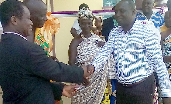 Mr Francis Owusu (left), the contractor of God’s Favour & Mercy Limited, handing over keys to the bungalow (inset) to the Board Chairman of the Dominase SDA Hospital, Pastor Stephen Anokye Mr Francis Owusu (left), the contractor of God’s Favour & Mercy Limited, handing over keys to the bungalow (inset) to the Board Chairman of the Dominase SDA Hospital, Pastor Stephen Anokye