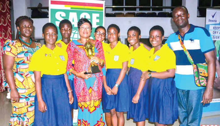• Ms Sylvia Isabella Laryea, the Headmistress,(with) trophy and participants of the school • Ms Sylvia Isabella Laryea, the Headmistress,(with) trophy and participants of the school