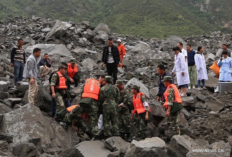 Landslide buries 112 people and 62 homes in Xinmo, China Landslide buries 112 people and 62 homes in Xinmo, China