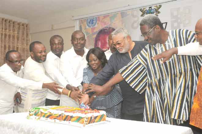 Former President, Ft Lt Jerry John Rawlings, being assisted to cut the 70th birthday cake donated by CLOGSAG. Among them is Nana Agyekum Dwamena (right), the Head of Civil Service. Picture: EBOW HANSON Former President, Ft Lt Jerry John Rawlings, being assisted to cut the 70th birthday cake donated by CLOGSAG. Among them is Nana Agyekum Dwamena (right), the Head of Civil Service. Picture: EBOW HANSON