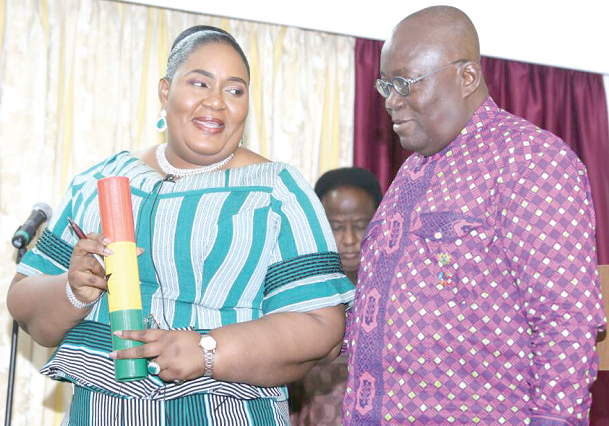President Akufo-Addo presenting the instrument of office to Mrs Irene Naa Torshie Addo President Akufo-Addo presenting the instrument of office to Mrs Irene Naa Torshie Addo