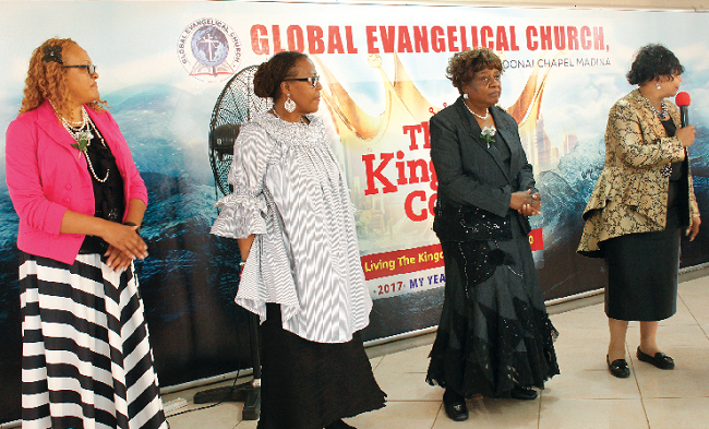 Rev. Mrs McLaughlin (with mic) introducing her team at the GEC Adonai Chapel, Madina Rev. Mrs McLaughlin (with mic) introducing her team at the GEC Adonai Chapel, Madina