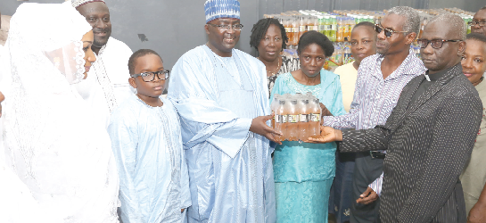 Dr Mahamudu Bawumia (4th left) presenting an item to Ms Mahella Narh (3rd right), the Headmistress of Akropong School for the Blind Dr Mahamudu Bawumia (4th left) presenting an item to Ms Mahella Narh (3rd right), the Headmistress of Akropong School for the Blind
