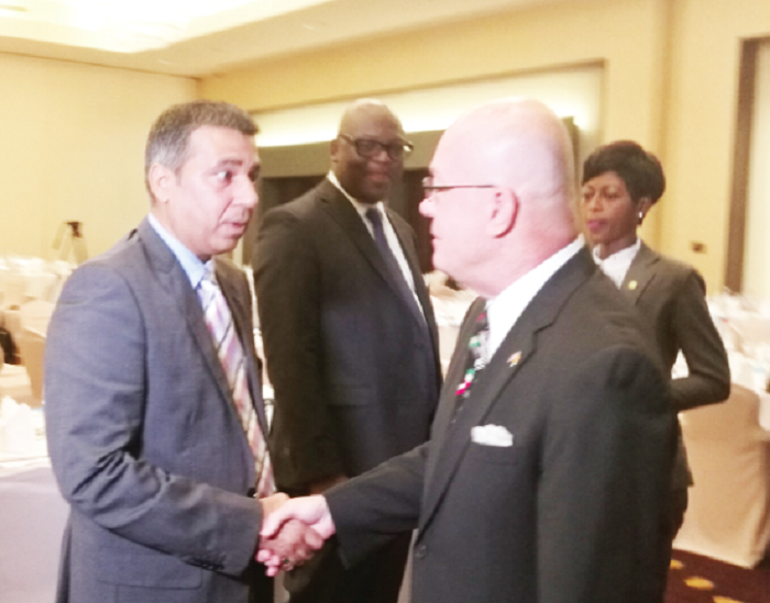 Mr Robert Jackson (right), the US Ambassador to Ghana, in a chat with a participant after the launch of the report. In the middle is Mr Simon Madjie, Executive Secretary of AMCHAM. Mr Robert Jackson (right), the US Ambassador to Ghana, in a chat with a participant after the launch of the report. In the middle is Mr Simon Madjie, Executive Secretary of AMCHAM.