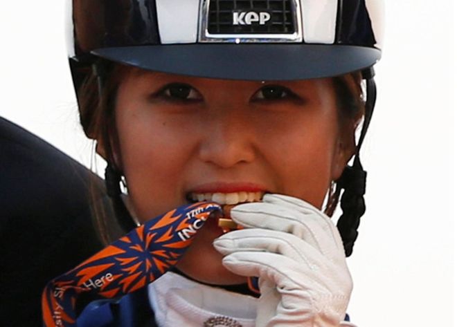 Chung Yoo-ra won a gold medal as part of a dressage team that competed in the 2014 Asian Games Chung Yoo-ra won a gold medal as part of a dressage team that competed in the 2014 Asian Games