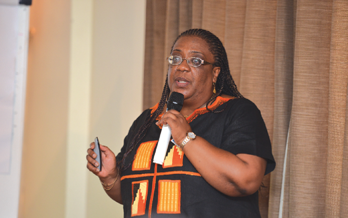 Dr Lydia Dsane-Selby, Director of Claims at the National Health Insurance Authority (NHIA) addressing some participants in the function Dr Lydia Dsane-Selby, Director of Claims at the National Health Insurance Authority (NHIA) addressing some participants in the function