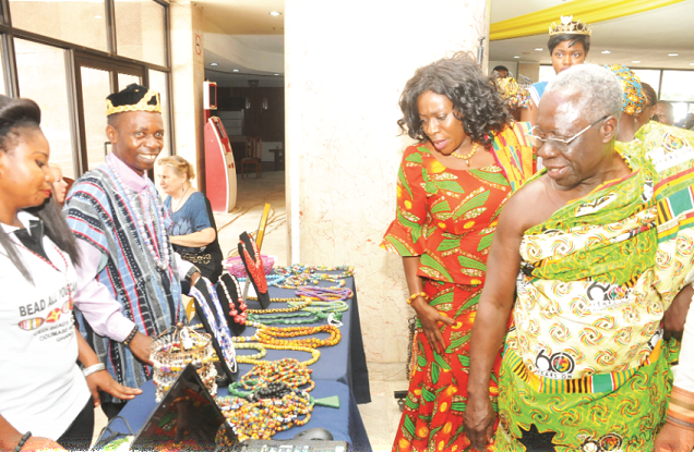 Senior Minister, Mr Yaw Osafo-Maafo and Mrs Catherine Afeku, Minister for Tourism, Arts and Culture admiring some beads on exhibition Senior Minister, Mr Yaw Osafo-Maafo and Mrs Catherine Afeku, Minister for Tourism, Arts and Culture admiring some beads on exhibition
