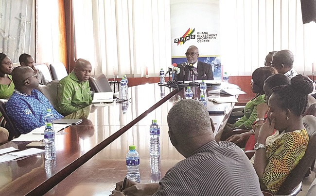 Mr Yofi Grant, (Head of table), CEO of GIPC, addressing the media
