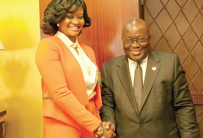  Ms Kyerematen-Jimoh, Country Manager, IBM Ghana, in a handshake with President Akufo-Addo
