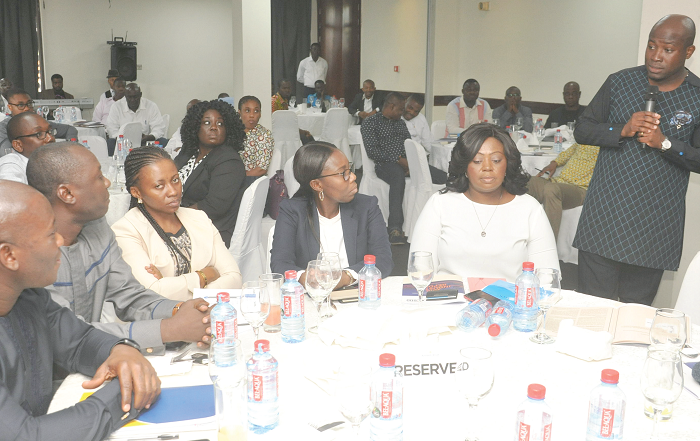  Mr Senyo Hosi addressing members at the AGM. Among them are Mr Mohammed Adam, Deputy Minister designate, and Mr Hassan Tampuli (left), acting CEO of NPA. Picture: EBOW HANSON