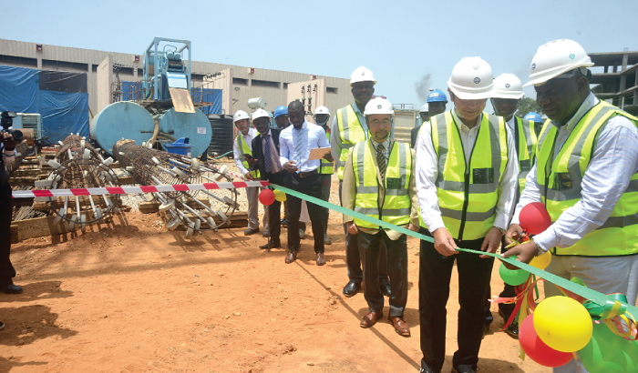 Mr Boakye Agyarko (right), the Minister of Energy, cutting a tape to mark the commencement of work on the project. Mr Boakye Agyarko (right), the Minister of Energy, cutting a tape to mark the commencement of work on the project.