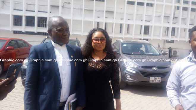 Queenie Akuffo leaving the court with her lawyer after she was acquitted and discharged on Wednesday by the court Woman accused of raping friend with 'dildo' acquitted and discharged by court Queenie Akuffo leaving the court with her lawyer after she was acquitted and discharged on Wednesday by the court Woman accused of raping friend with 'dildo' acquitted and discharged by court