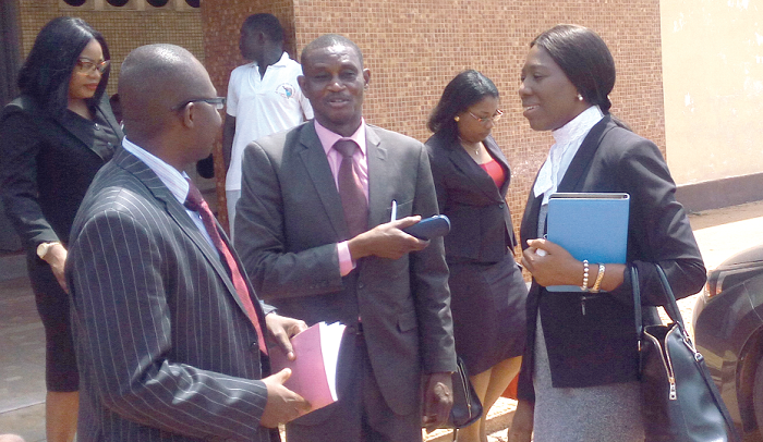 The Director of Public Prosecutions, Mrs Yvonne Atakora Oboubisa, (right), in a hearty chat with Superintendent Francis Baah, the former prosecutor in the case. Picture: EMMANUEL EBO HAWKSON. The Director of Public Prosecutions, Mrs Yvonne Atakora Oboubisa, (right), in a hearty chat with Superintendent Francis Baah, the former prosecutor in the case. Picture: EMMANUEL EBO HAWKSON.