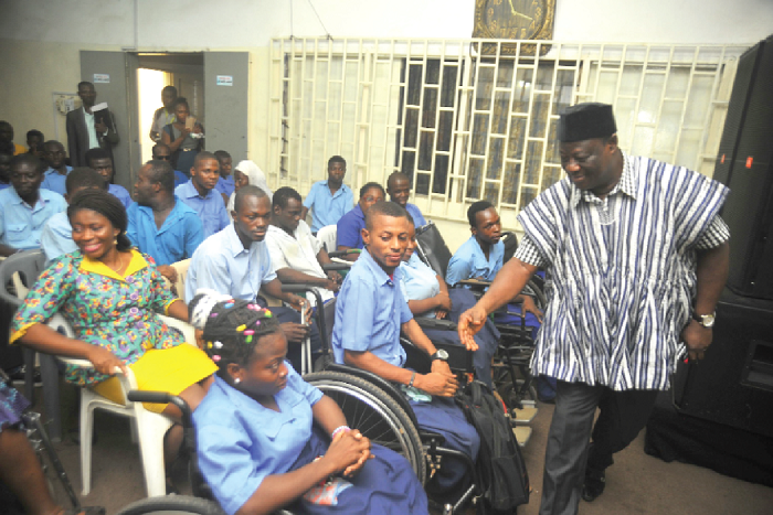 Mr Amoako Atta (standing) interacting with some of the PWDs in Accra. Pictures: EMMANUEL QUAYE Mr Amoako Atta (standing) interacting with some of the PWDs in Accra. Pictures: EMMANUEL QUAYE