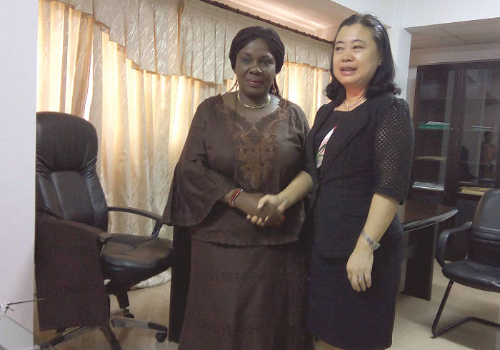 Mrs Cecilia Dapaah (left) in a handshake with Ms Sun Baohong after their meeting Mrs Cecilia Dapaah (left) in a handshake with Ms Sun Baohong after their meeting