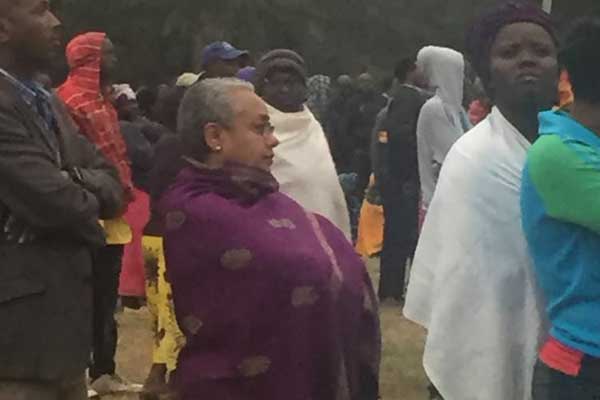 First Lady Margaret Kenyatta standing in a queue at Nairobi’s St Mary School polling centre in Lavington, Nairobi. First Lady Margaret Kenyatta standing in a queue at Nairobi’s St Mary School polling centre in Lavington, Nairobi.