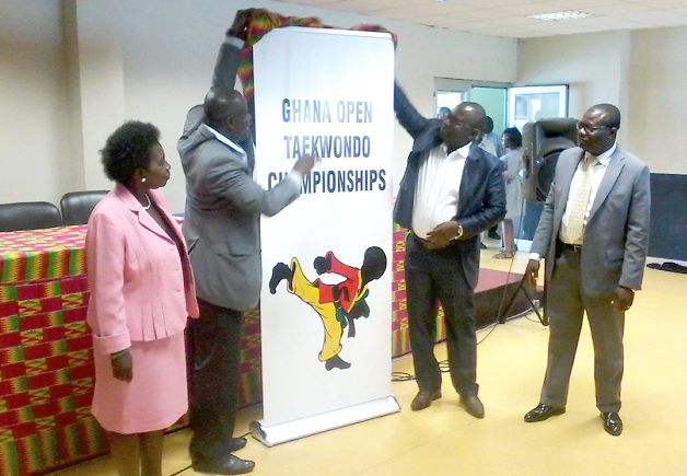 The Director General of the NSA, Mr Robert Sarfo Mensah (right), with the support of the Director of Sports at the NSA, Mr Joshua Mensah, unveiling the logo for the tournament while the president of the GTF, Mr Frederick Lartey Otu, looks on The Director General of the NSA, Mr Robert Sarfo Mensah (right), with the support of the Director of Sports at the NSA, Mr Joshua Mensah, unveiling the logo for the tournament while the president of the GTF, Mr Frederick Lartey Otu, looks on