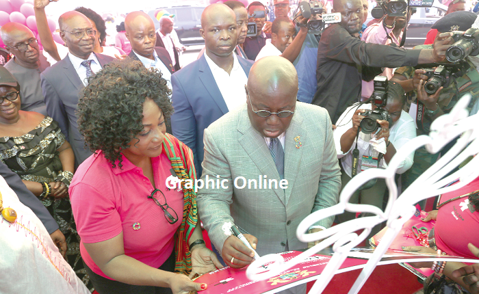 President Nana Addo Dankwa Akufo-Addo appending his signature to signify the launch of the HeForShe Project. On his right is Ms Otiko Afisah Djaba. Picture: SAMUEL TEI ADANO President Nana Addo Dankwa Akufo-Addo appending his signature to signify the launch of the HeForShe Project. On his right is Ms Otiko Afisah Djaba. Picture: SAMUEL TEI ADANO