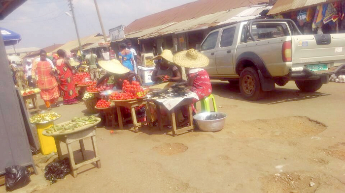 Brisk trading right on the street behind the Central Market in Sunyani Brisk trading right on the street behind the Central Market in Sunyani