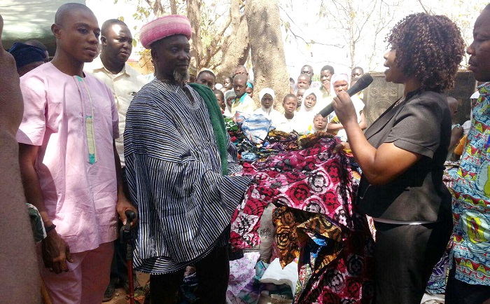 The Northern Regional Coordinator of NVTI, Madam Ivy Yeboah (right), presenting an item to the Regent of Sang, Mr Musah Alhassan The Northern Regional Coordinator of NVTI, Madam Ivy Yeboah (right), presenting an item to the Regent of Sang, Mr Musah Alhassan