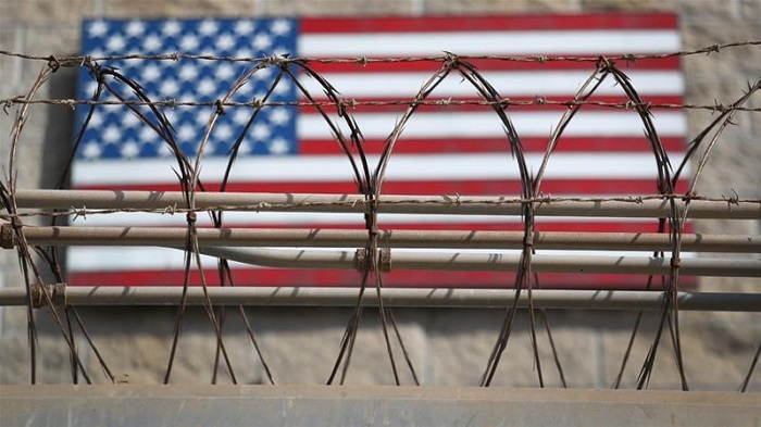 There are 59 prisoners remaining at the controversial detention centre [John Moore/Getty Images]