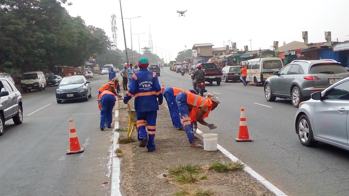 Some of the Zoomlion personnel beautifying the streets of Accra Some of the Zoomlion personnel beautifying the streets of Accra