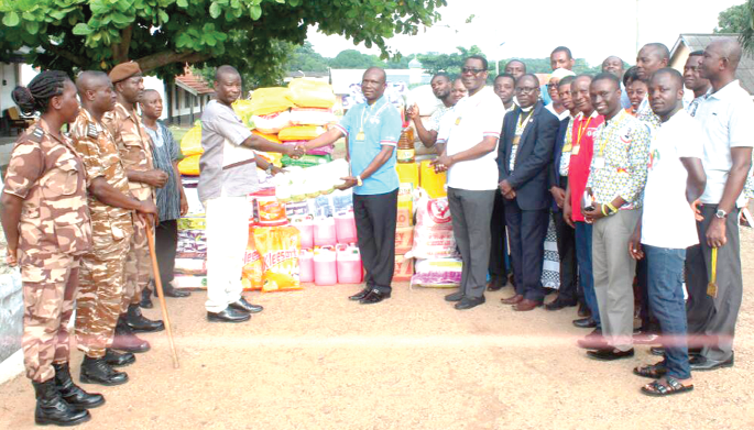 Apostle Richard Ohene Gyan handing over the items to Rev. Anthony Brown
