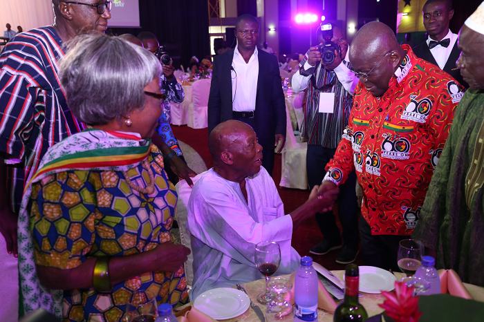 President Akufo-Addo tapping Mr Haruna Esseku (seated), a former Chairman of the NPP, during the 57th Republic Day in Accra. Looking on are some senior citizens President Akufo-Addo tapping Mr Haruna Esseku (seated), a former Chairman of the NPP, during the 57th Republic Day in Accra. Looking on are some senior citizens