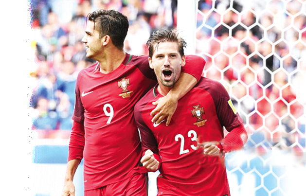 Andre Silva joins his brother, Andrien (right) to celebrate his winning goal for Portugal Andre Silva joins his brother, Andrien (right) to celebrate his winning goal for Portugal