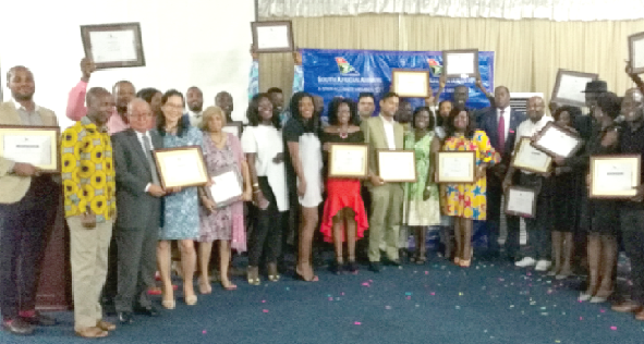 Award winners pose to celebrate their laurels. Award winners pose to celebrate their laurels.